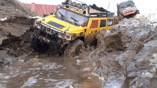 This Is The Only Way You'll See A Hummer H2 Off-Roading With A MAN KAT